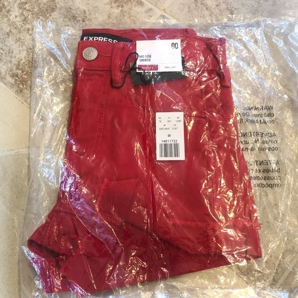🆕 Express mid rise flip hem shortie shorts…